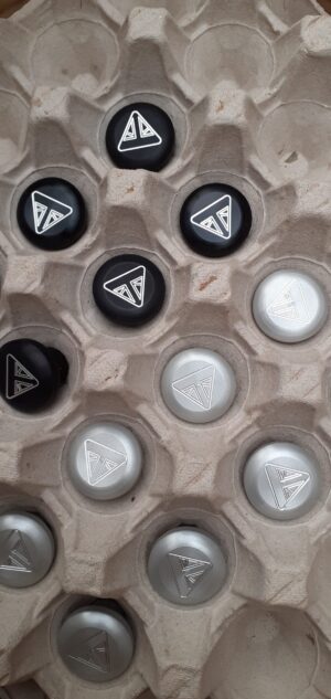 Rocket 3 Front Axel Plug Logo